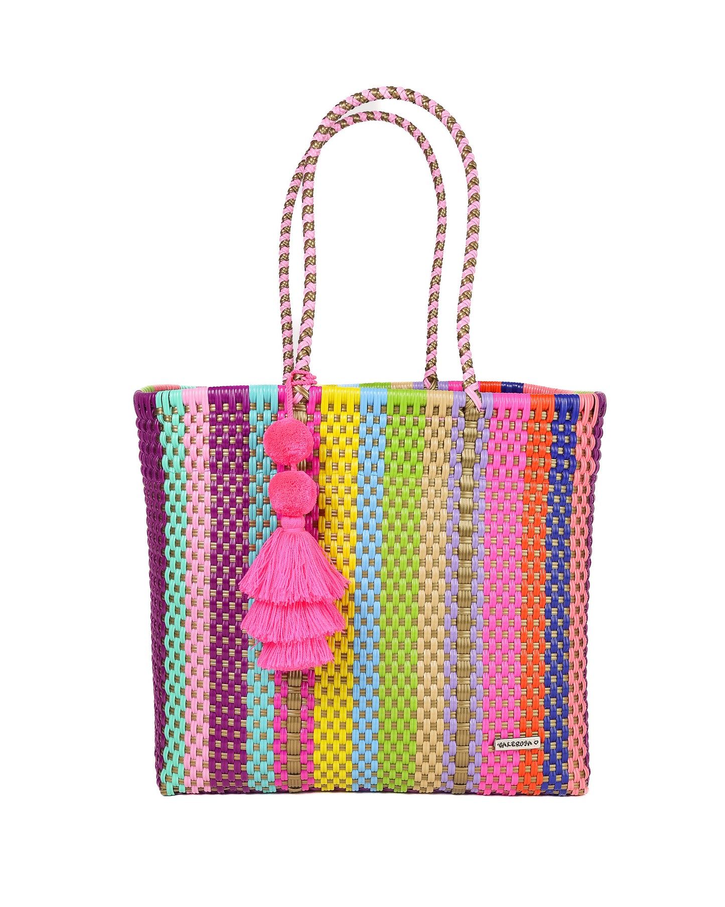 A multi-colored tote bag with woven gold throughout featuring a pink pom pom tassel.