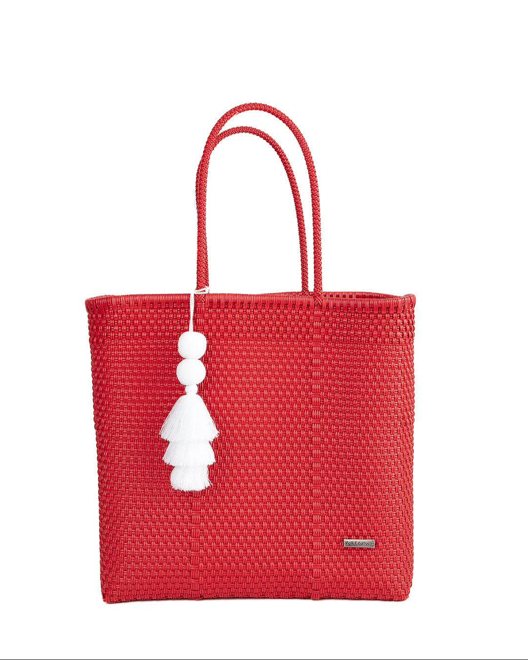 Red woven tote bag with white tassels on a white background